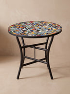 Bahja handmade zellige mosaic side table, multicolour eight-point stars on cream, on its folding wrought iron base