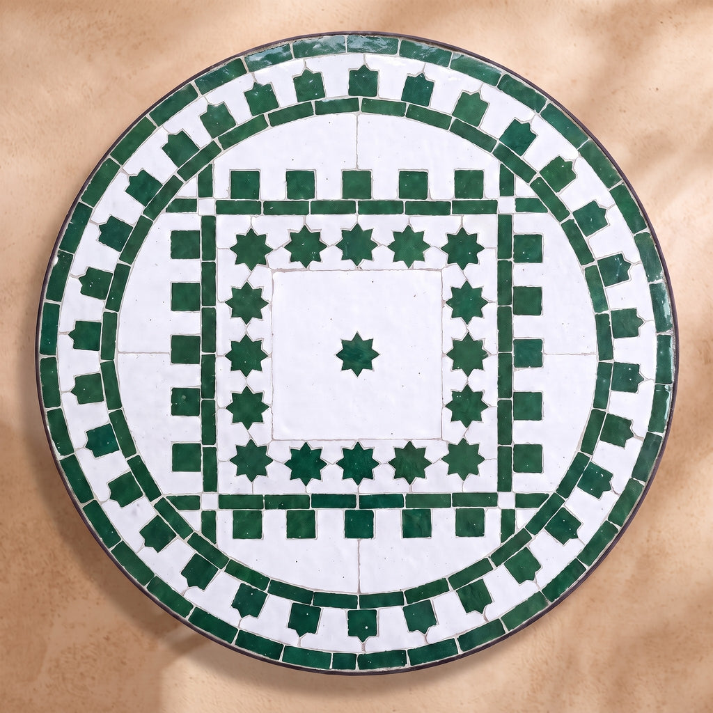 Ghaba zellige tabletop seen from above, Salé friezes and star ring in green on white