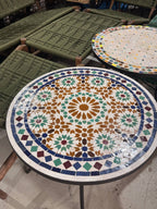 Close view of the Kawkab zellige top, hand-cut green, navy and burgundy pieces