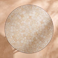 Semsem zellige mosaic side table seen from above, concentric rings of hand-cut tiles in cream, ivory and sand, colour rendering of the design