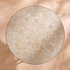 Semsem zellige mosaic side table seen from above, concentric rings of hand-cut tiles in cream, ivory and sand, colour rendering of the design