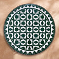 Zitoun zellige tabletop seen from above, Fez star lattice in green on white